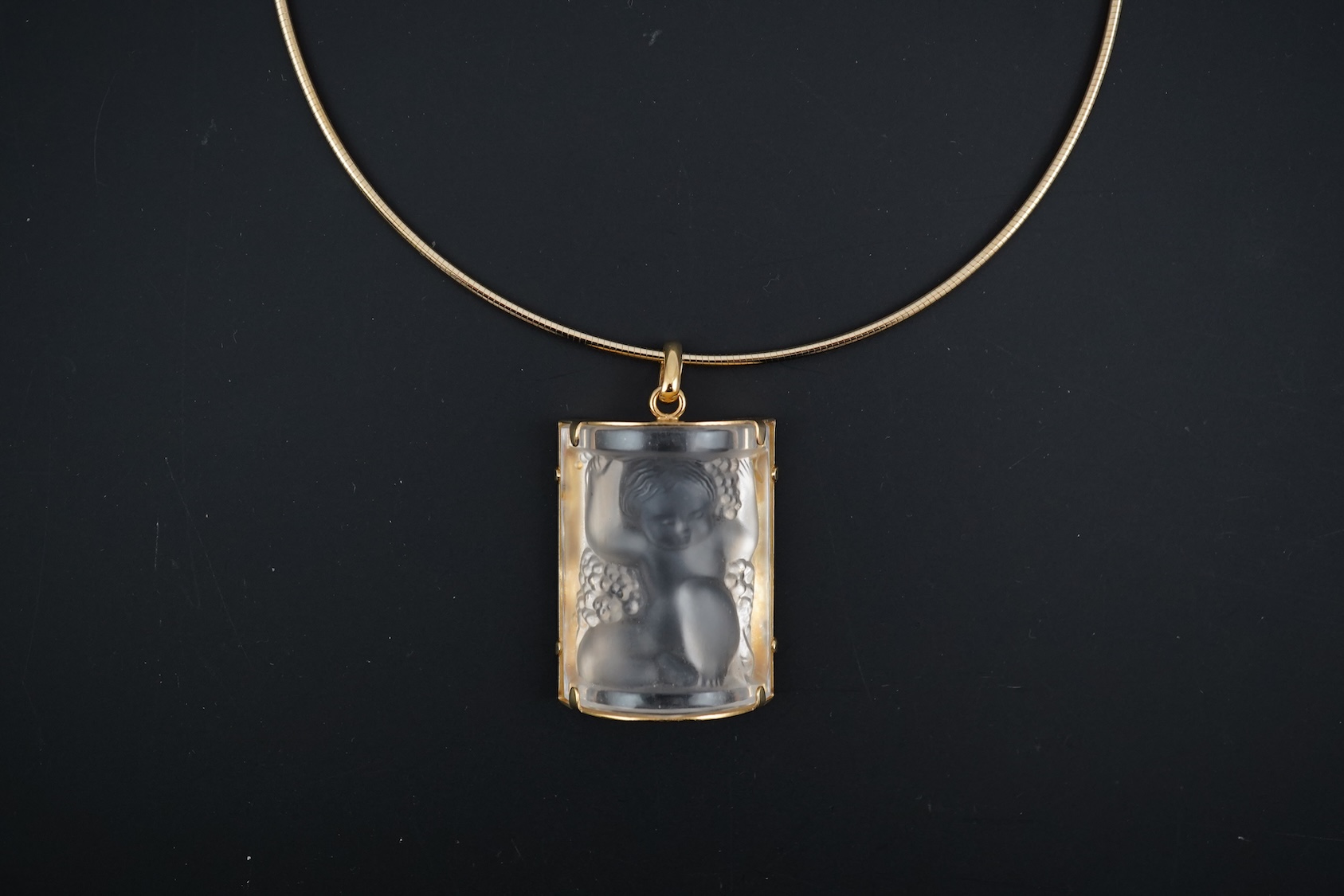 A Lalique Enfants pendant necklace, cased